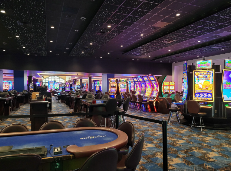 Poker table beneath a ceiling of 2x2 fiber optic starlight panels at a Minnesota casino